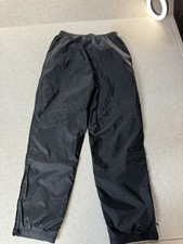 Nike Track Pants Womens M Black Nylon Windbreaker Storm Fit Lightweight Wide Leg