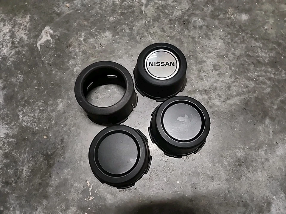 Juego tapacubos tapacubos central rueda camioneta Nissan Pathfinder 1988-1995 OEM D21 Foto 2 de 4