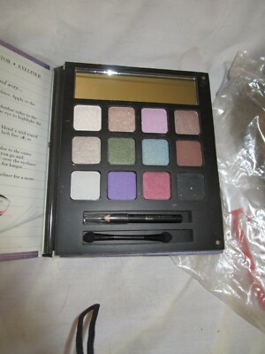 New in bag Elf Beauty Book, 12 Eyeshadows, 1 eyeliner & 1 eyeshadow applicator