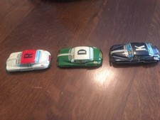 Lot of 3 vintage tin friction cars great color
