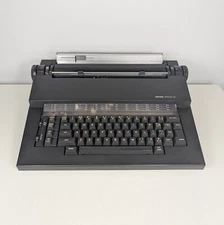 Olivetti Praxis 35 Portable Electric Typewriter w/ Carrying Case w Ink Installed