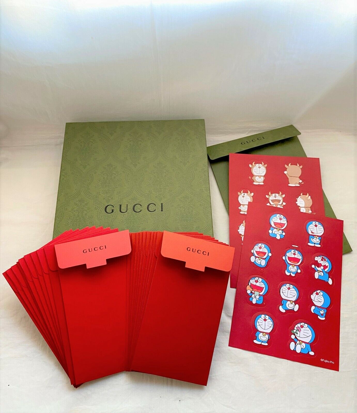 Gucci 2021 Doraemon cat red packet for star eye fur mug slippers candle  backpack