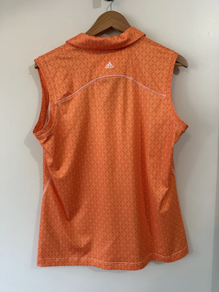 Camiseta sin mangas para mujer Adidas de golf sin mangas Climacool 1/4 cremallera naranja geo talla L Foto 2 de 4