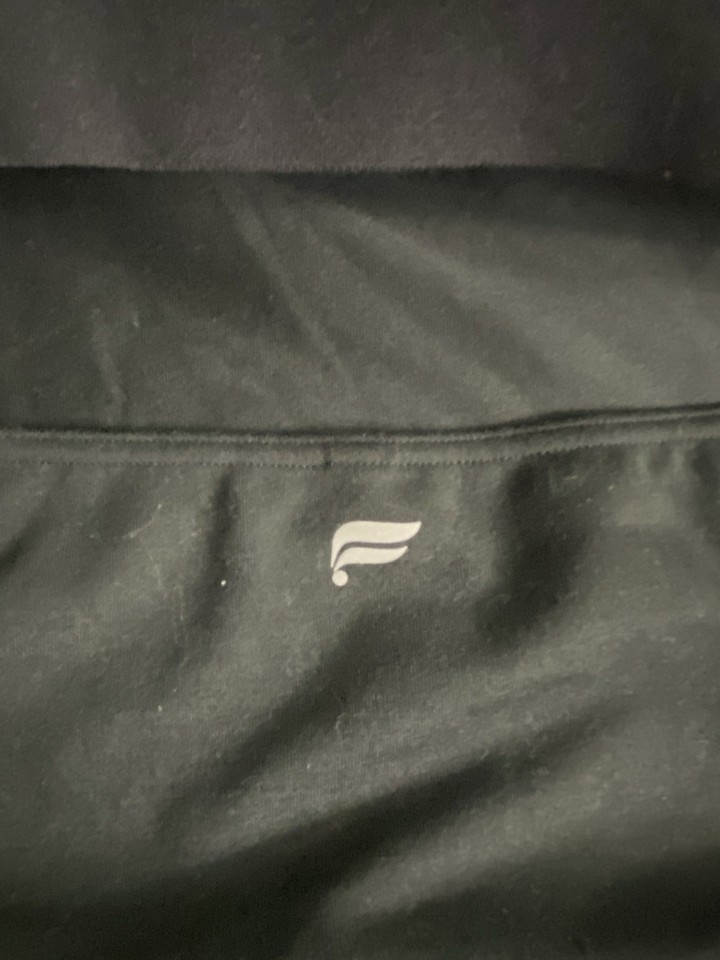 Woman’s Fabletics Top with Built In Bra Fashionable Twist In Back Open ...