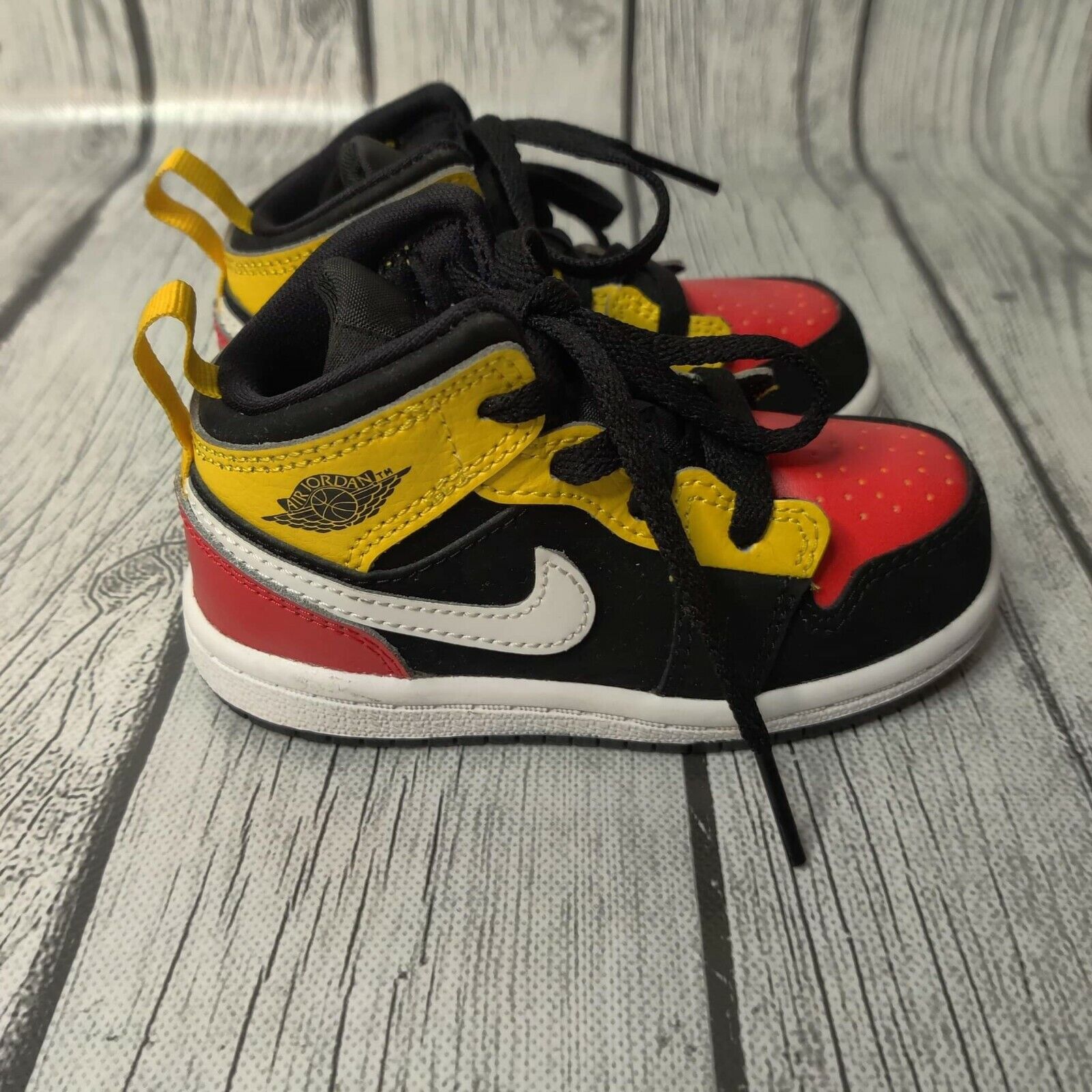 black and yellow jordans toddler