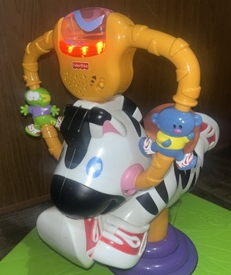 Fisher-Price Go Baby Bounce & Spin Zebra Ride-On with Lights and
