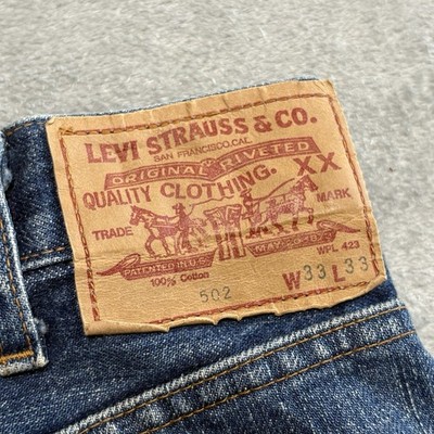 Vintage Levi's 502XX Jeans Men's W33 Made in Japan Selvedge Red