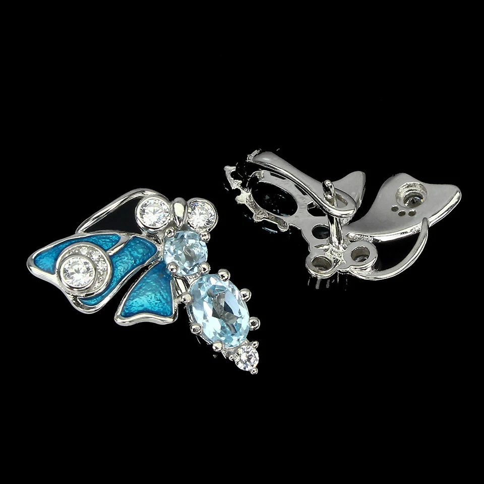 925 Argento Sterling Ovale Topazio Blu 7x5mm Finto Zirconia Cubica Ape Orecchini - Immagine 3 di 4