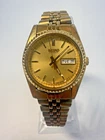 Vintage Seiko Quartz 7N83-0041 Gold Tone Day Date Watch Runs May 1999