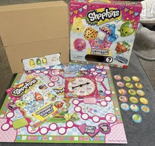 Shopkins Supermarket Scramble Game with 4 Exclusive Collectible Shopkins Charact