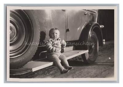 Well Feeded Boy with Cookie Sitting on Running Board of Car - Old Photo 1930
