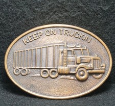 WG13162 NOS FUNNY VINTAGE 1970s  KEEP ON TRUCKIN  TRUCKER BRASS BELT BUCKLE