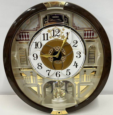 Seiko Melodies in Motion Musical Wall Clock 45 Songs Rotating Dial