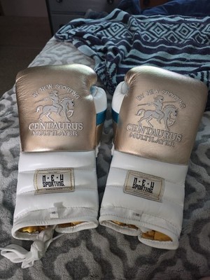 Brand New Never Worn Or Used NEW SPORTING CENTAURUS 16 OZ GOLD AND AQUA BLUE