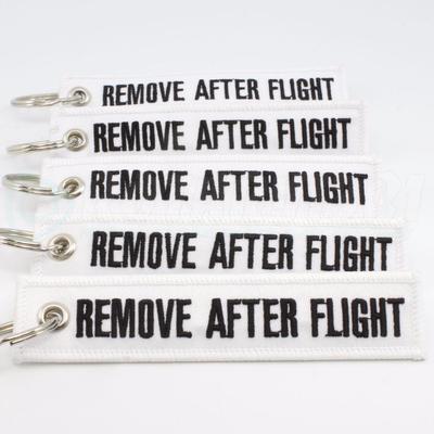 REMOVE AFTER FLIGHT KEYCHAIN QTY= 5 PCS WHITE/black TAGS FLAGS PILOT CREW