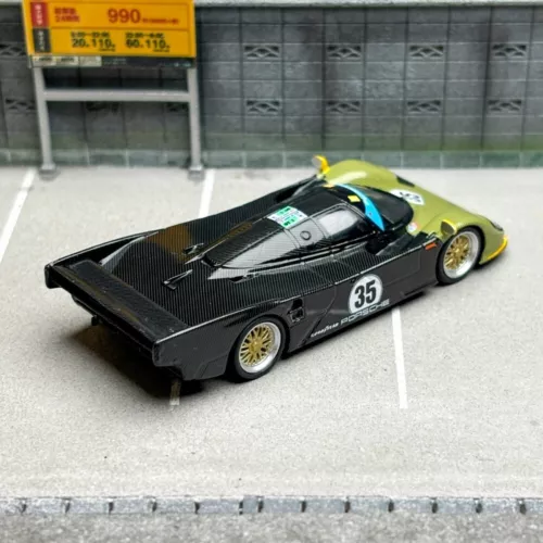 Spark 1:64 Porsche 962 auto display edizione limitata rivestimento mimetico modello in lega - Foto 7 di 8