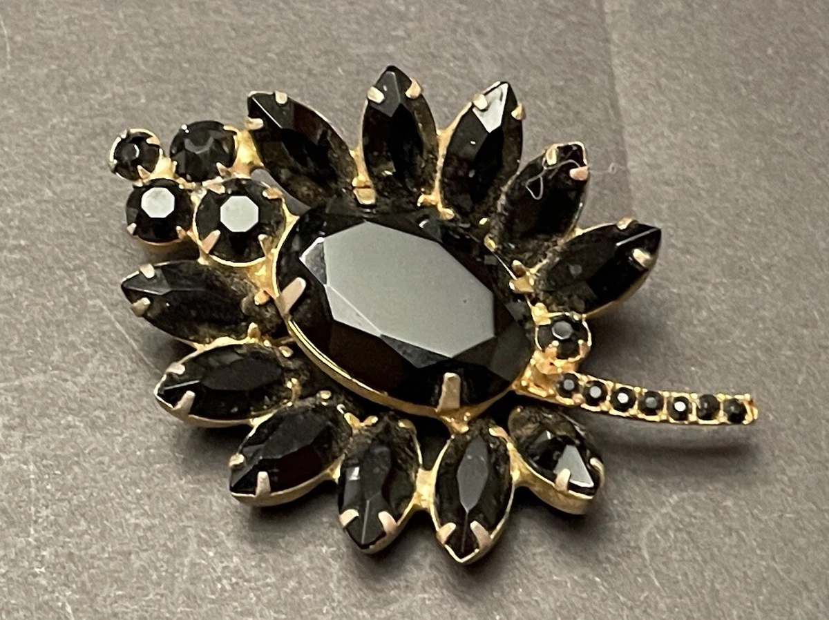Jet brooch store