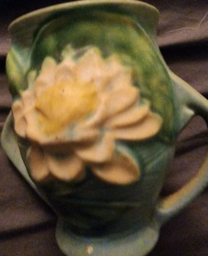 vintage Roseville Water Lily pottery, specifically a squat or double-handled vas