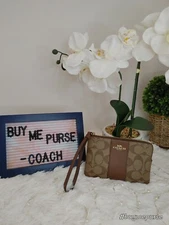 COACH CORNER ZIP WRISTLET IN SIGNATURE CANVASS