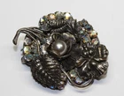 VINTAGE MIRIAM HASKELL SILVER TONE BROOCH
