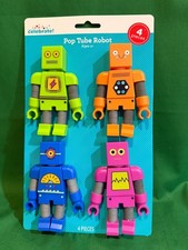 Celebrate 4 New in Pack Stretchy 4" Plastic Robots BX84