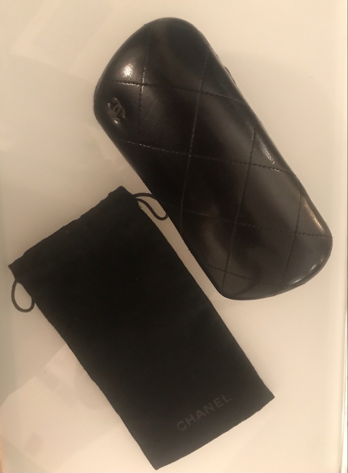 Genuine CHANEL black faux leather hard sunglass case with CC charm and soft case