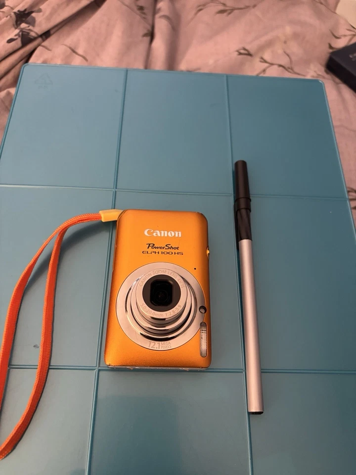 Cámara excavadora Canon ELPH-100hs-naranja-12,1 MP-tarjeta SD y accesorios en caja-exc. Foto 2 de 4