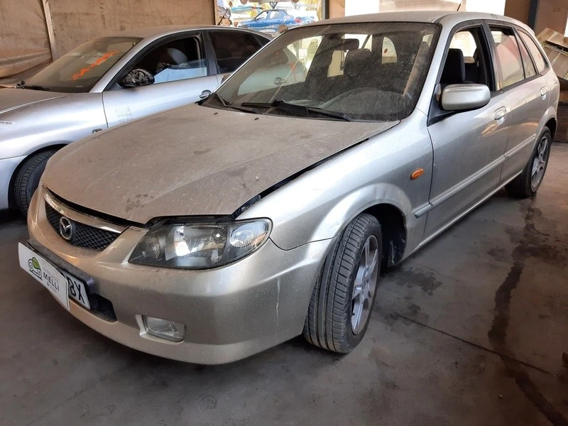 B25D73560A elevalunas trasero izquierdo para MAZDA 323 F VI 1.6 1998 6460054 - Imagen 2 de 4