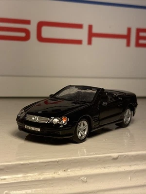 Welly Mercedes Benz SL500 Black Convertible 12cm Diecast Pullback Car 1:39 - Image 1 of 4