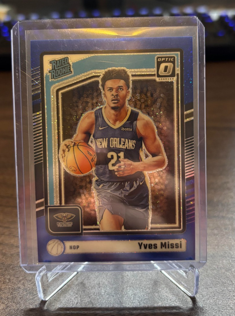 2024-25 Panini Optic Yves Missi Rated Rookie Blue Glitter /15 Pelicans #265 RC