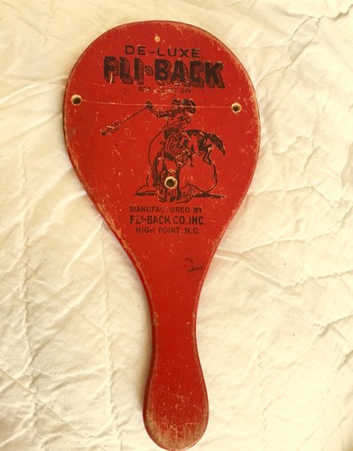 vintage red fli-back wood paddle ball toy cowboy bucking horse