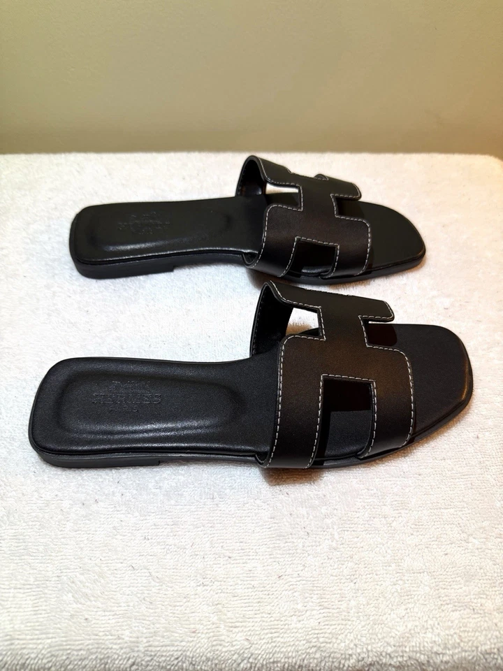 Sandalias Hermes Oran H de piel de becerro negra para mujer EU 37 US 6,5‐7 con bolsas antipolvo Foto 2 de 4