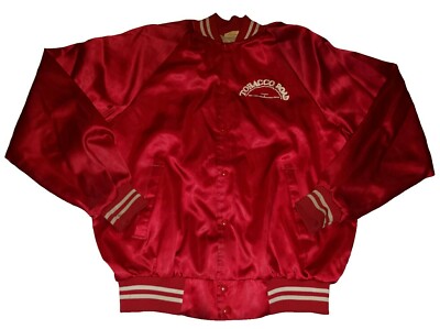 The Blue Divide: Duke, North Carolina, and the Battle on Tobacco Road  jacket