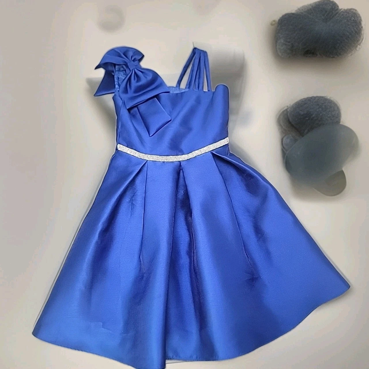 Rare Edition Girls Mikado Bow Shoulder Dress Blue Satin Jeweled Waist Pleated
Opens in a new window