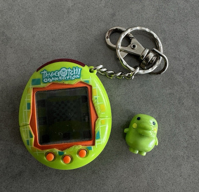 Tamagotchi Connection V1 2004 Green & Orange Plaid Matrix Checkered + Figure