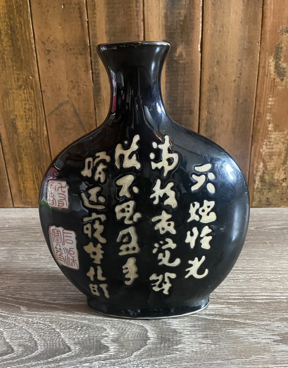 Writing 2024 on porcelain