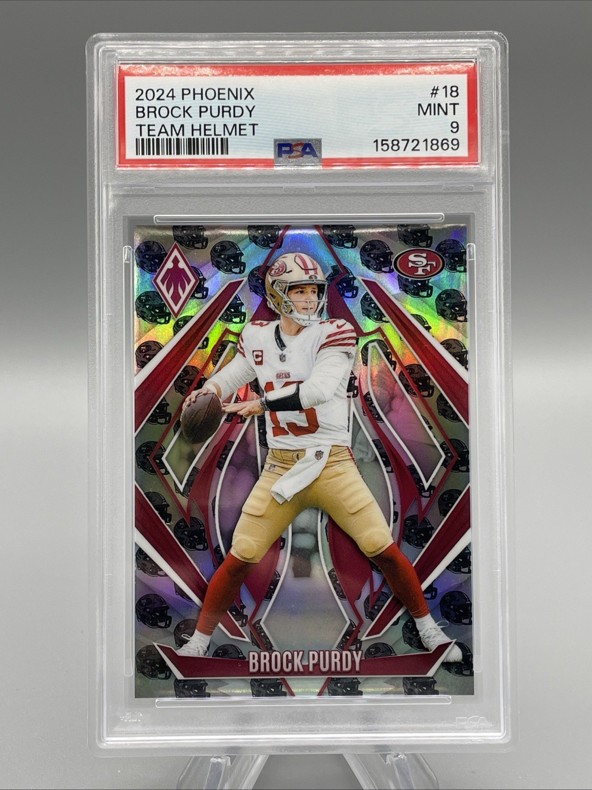 2024 Panini Phoenix - Brock Purdy #18 Team Helmet /399 San Francisco 49ers PSA 9 view 1