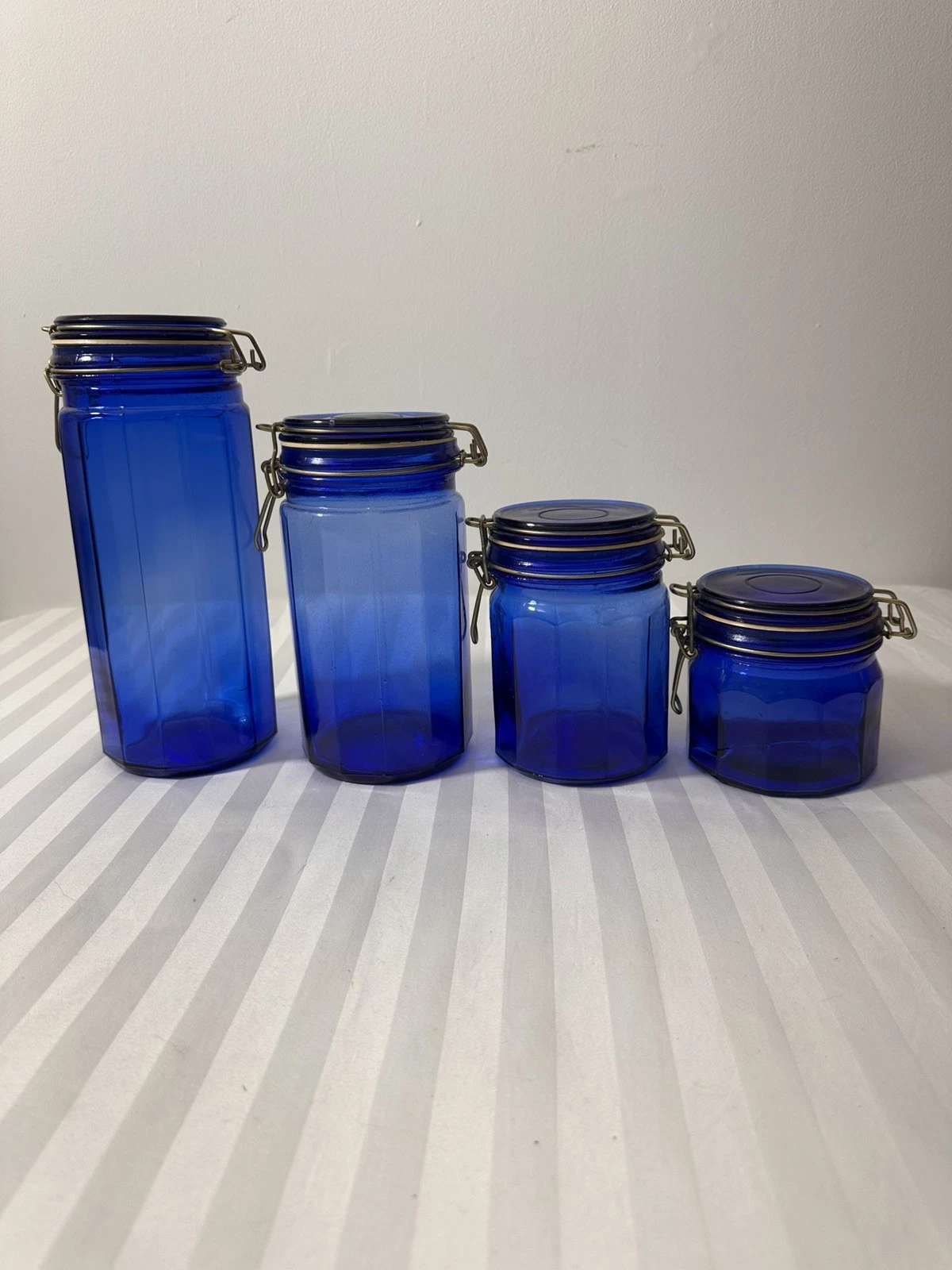 Vintage 4-Piece Cobalt Blue Glass Canister Set – Wire Bail Lids, 12-Panel Design