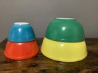 LOWERED PRICE PYREX SET OF 4 PRIMARY COLORS NESTING BOWLS GOOD CONDITION