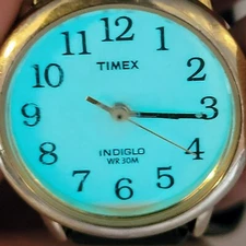 Timex Indiglo Gold Tone Analog Ladies Watch Sz. 6" White Dial, Black Strap 25mm