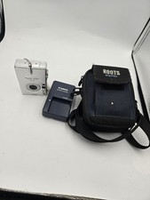 CANON POWERSHOT SD 200 DIGITAL ELPH, SILVER WITH BATTERY/CHARGER, BLACK CASE G/C