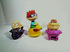 LOTE DE 3 JUGUETES DE COMIDA PARA NIÑOS RUGRATS 1 CUERDA Y 2 RUEDAS DE FRICCIÓN DE TRACCIÓN DE COLECCIÓN 1998 RARO