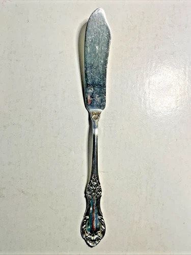 International Sterling Silver Wild Rose 5 3/4'' Butter Spreader Knife 35 Grams