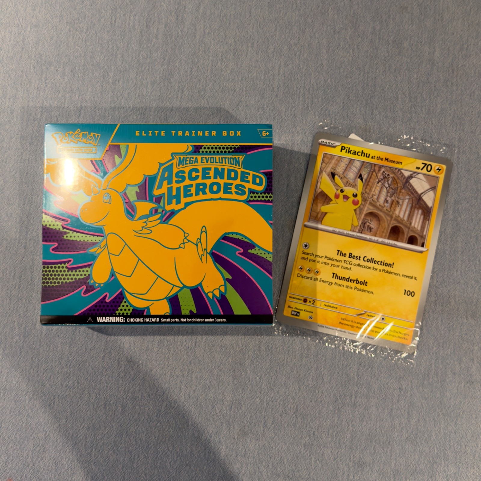 Pokemon TCG: Ascended Heroes Elite Trainer Box and Pikachu at the Museum Card