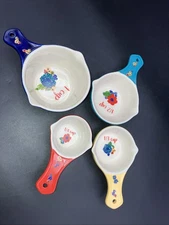 Set Of Four Porcelain Measuring Cups. Beautiful Designs.