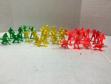 Vintage Lot of 40 Plastic Cowboys  Indians Miniature Toys Red Green Yellow.