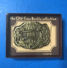 NIB Vintage Brass Belt Buckle by Oden Inc "Bob" The Old Time Buckle Collection
