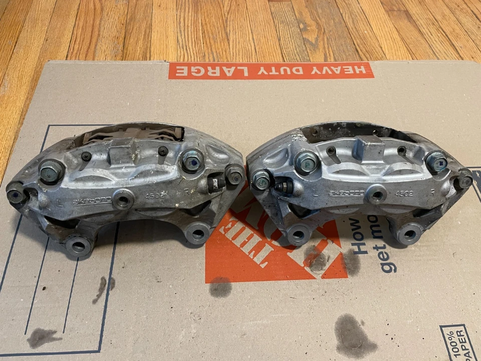 Infiniti G37/Q50/Q60 Akebono OEM Front & Rear Calipers Set 4502 & 4101 - Image 3 of 4
