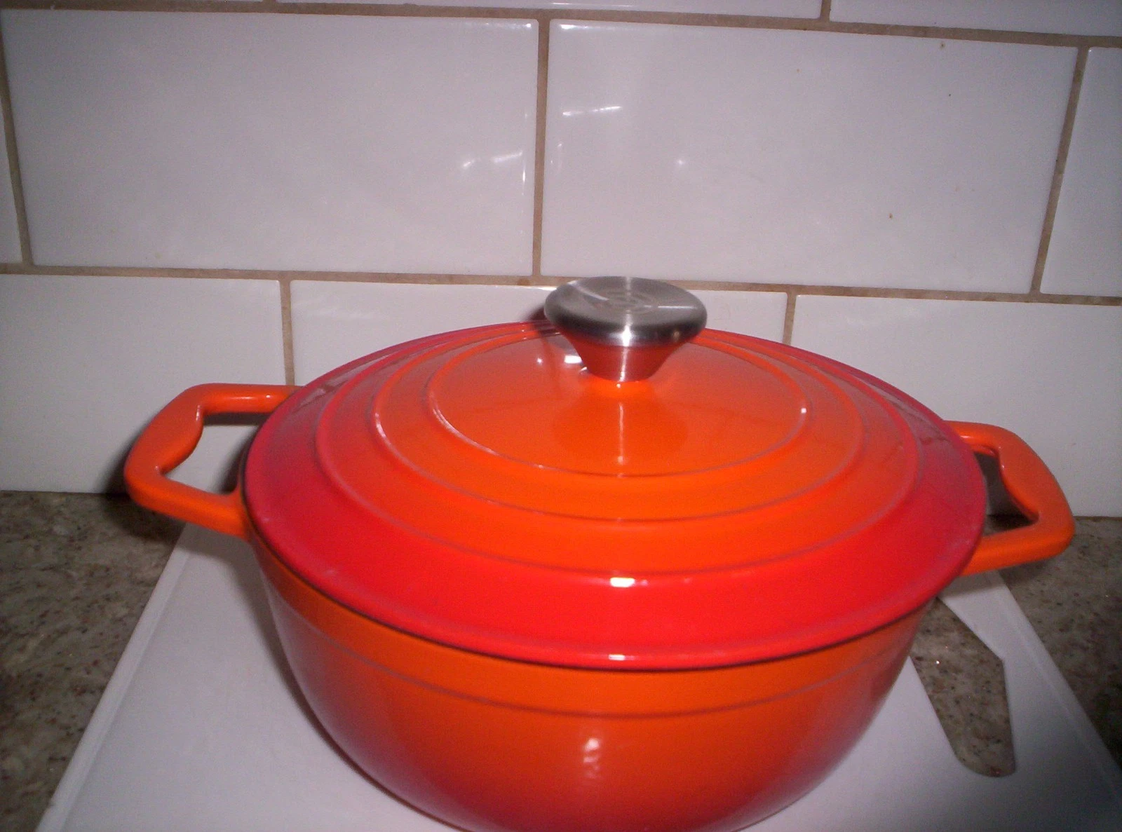 COOKS ESSENTIALS ROUND ORANGE CAST IRON DUTCH OVEN PAN