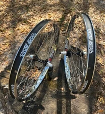 TNT BICYCLES, BMX WHEEL SET - 20, 24, 26, 29" SUN RHYNO LITE XL CHROME & BLACK